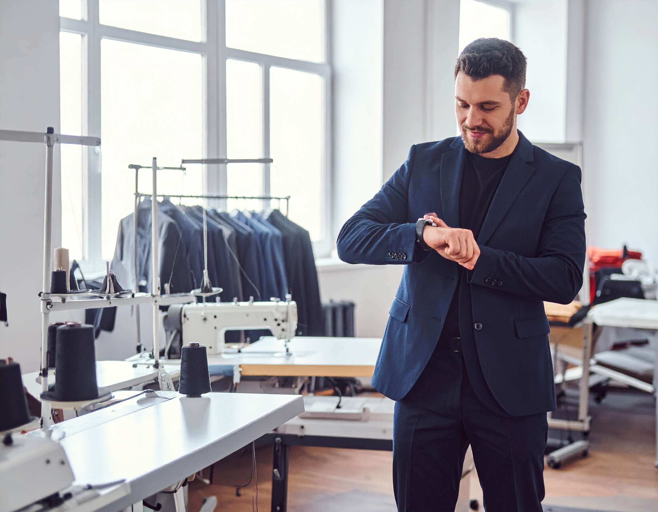 stylish man in a perfectly tailored navy suit